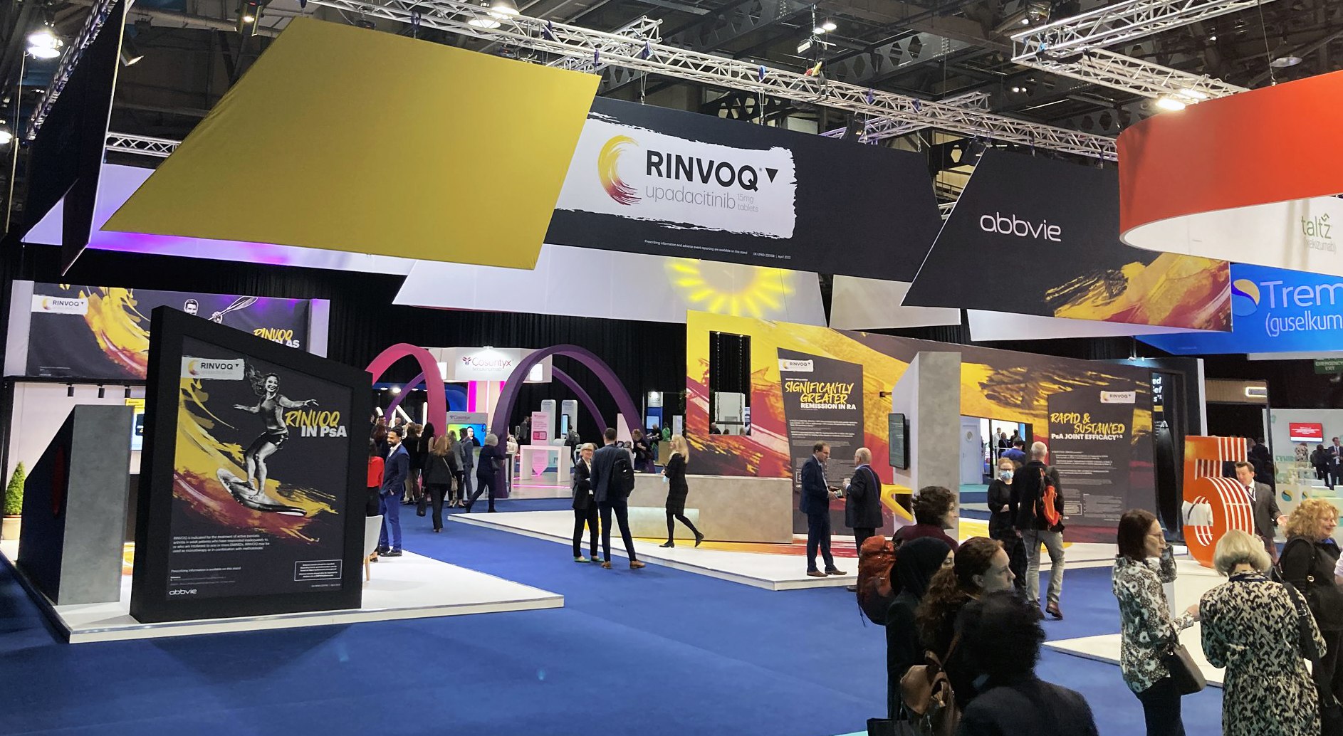 Vibrant exhibition signage at a show, showcasing bold displays and attendee engagement